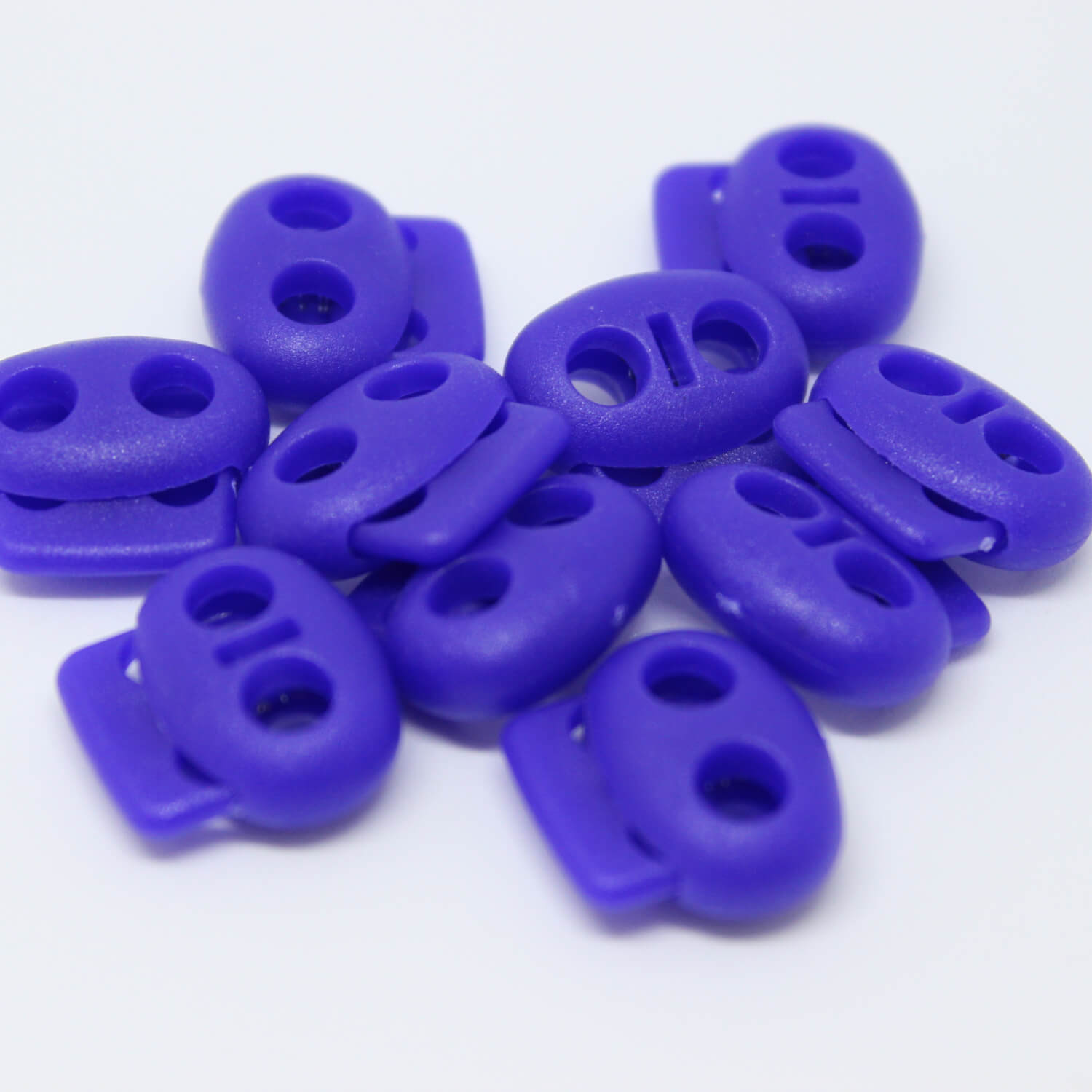 10x 2-Loch-Kordelstopper - 17mm - Pantone 2736C (Blau-Lila)
