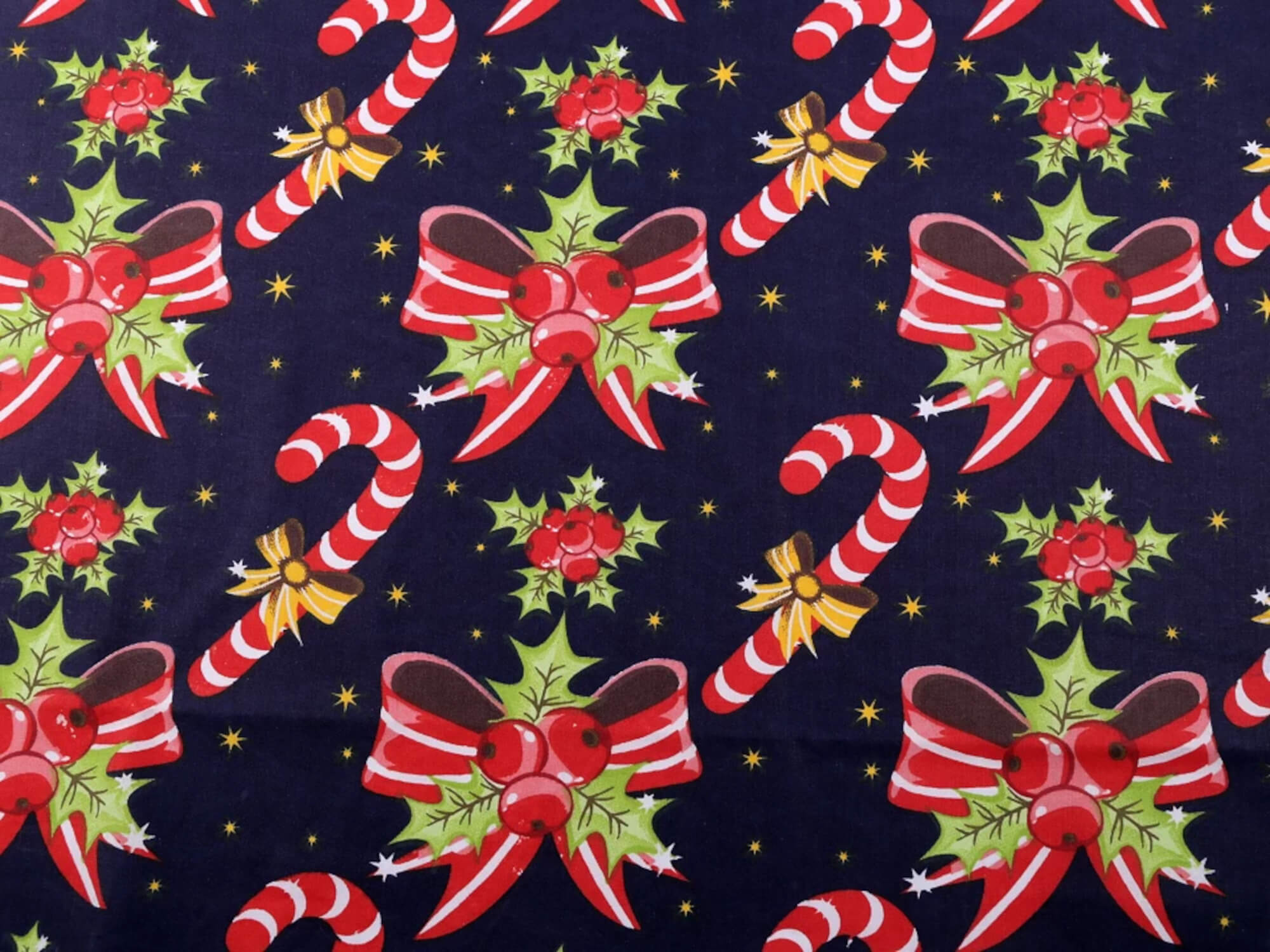 0,5 m | Baumwollstoff mit Weihnachtsmotiv Stechpalme & Zuckerstange in dunkelblau